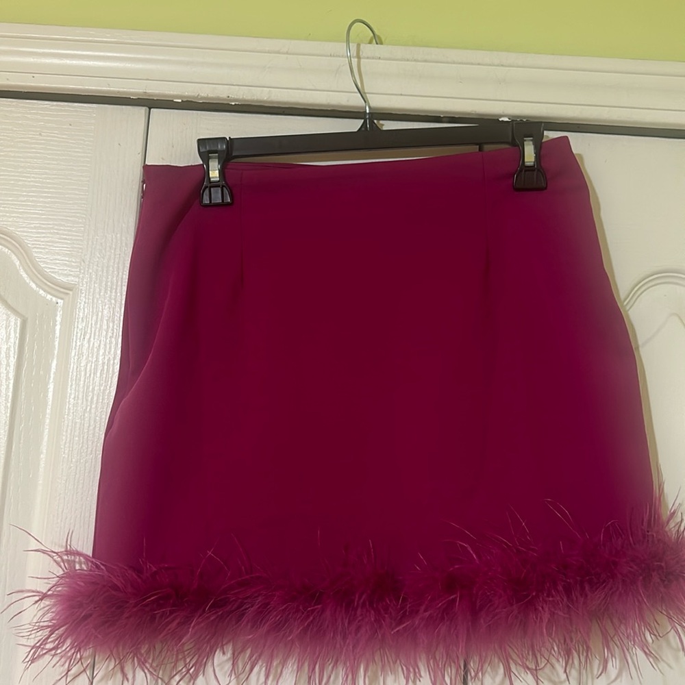 HYFVE Mini skirt with feathered trim.